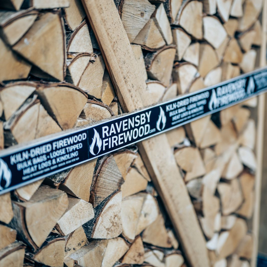 The Benefits of Kiln‑Dried Firewood Over Seasoned Logs and How to Store Your Supply