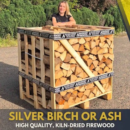 Woman standing behind a stack of ash firewood on a pallet with 'Ravensby Firewood' branding.