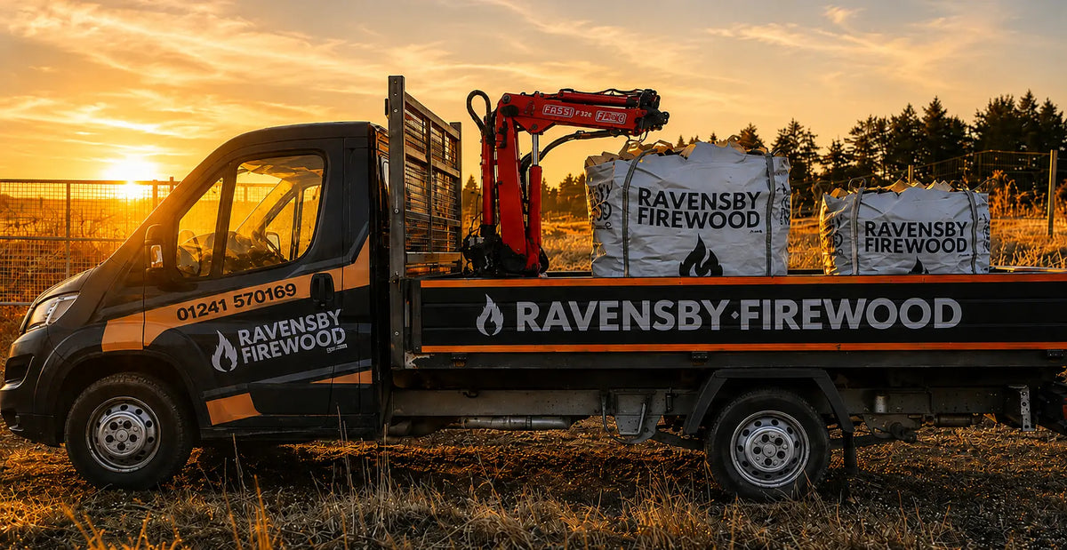 Truck carrying Ravensby Firewood kiln-dried bulk bags of logs in two sizes with sunset in the background