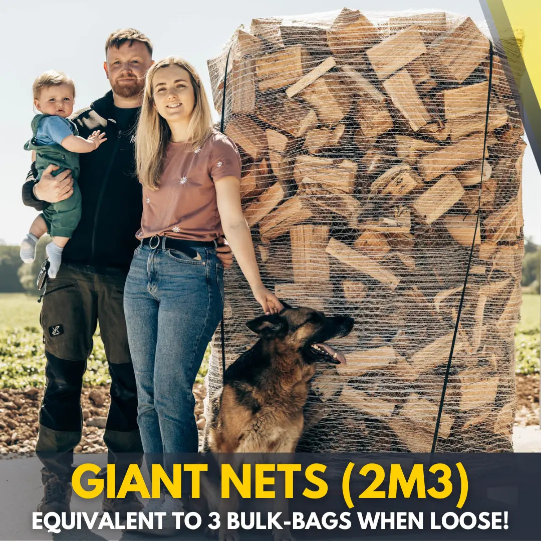Ravensby Firewood family members standing in front of a bulk load of kiln-dried hardwood logs near Arbroath, Angus.