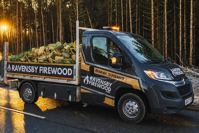 A bulk load of loose tipped kiln-dried hardwood logs on a delivery van near Arbroath