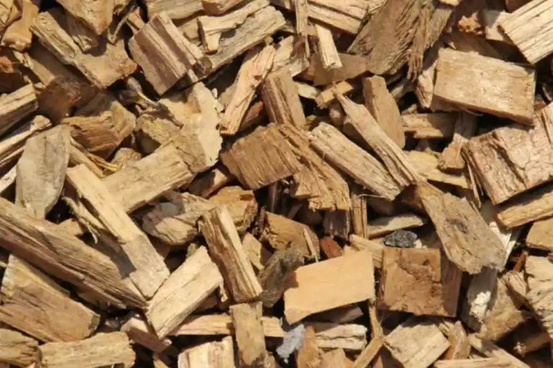 Close-up of a pile of wood chip weed suppressant available for delivery to the Brechin area